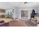 Inviting living room with sliding door access to outdoor patio at 17207 Bosley Dr, Spring Hill, FL 34610