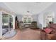 Comfortable living room with plush seating and large windows for natural light at 17207 Bosley Dr, Spring Hill, FL 34610