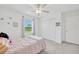 Bedroom with a single bed and closet at 17741 Tawny Malt Pl, Land O Lakes, FL 34638