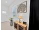 Welcoming entryway featuring neutral walls, tiled floor, and decorative accents at 17741 Tawny Malt Pl, Land O Lakes, FL 34638