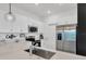 Modern kitchen with stainless steel appliances and white cabinets with sleek hardware at 17741 Tawny Malt Pl, Land O Lakes, FL 34638