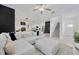 Bright and airy living room showcasing a comfortable sectional and contemporary design at 17741 Tawny Malt Pl, Land O Lakes, FL 34638