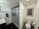 Bathroom featuring glass shower, vanity, and decor at 17926 Calkins Ct, Spring Hill, FL 34610