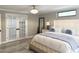 This spacious main bedroom features stylish decor, double doors and a comfortable sitting area, creating a serene retreat at 17926 Calkins Ct, Spring Hill, FL 34610