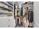 Walk-in closet features shelving and hanging storage for organization and convenience at 1803 E Powhatan Ave, Tampa, FL 33610
