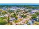 Charming neighborhood aerial shot showcasing a well-maintained home with nearby shopping and easy access to amenities at 208 Palmetto W Rd, Nokomis, FL 34275