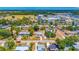 Charming neighborhood aerial shot showcasing a well-maintained home with nearby shopping and easy access to amenities at 208 Palmetto W Rd, Nokomis, FL 34275