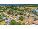 Charming neighborhood aerial shot showcasing a well-maintained home with nearby shopping and easy access to amenities at 208 Palmetto W Rd, Nokomis, FL 34275