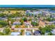 Charming neighborhood aerial shot showcasing a well-maintained home with nearby shopping and easy access to amenities at 208 Palmetto W Rd, Nokomis, FL 34275
