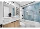 Modern bathroom is complete with new fixtures, a shower and a tub at 208 Palmetto W Rd, Nokomis, FL 34275