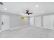 Bright bedroom with new white marble-look tile flooring, and large closets at 208 Palmetto W Rd, Nokomis, FL 34275