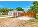 Cozy home with a convenient carport and neatly maintained gravel landscaping at 208 Palmetto W Rd, Nokomis, FL 34275