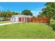 Expansive lawn and a covered carport add charm to this well-maintained home at 208 Palmetto W Rd, Nokomis, FL 34275