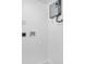 Clean and simple laundry area with a modern water heater, utility hookups and electrical outlets at 208 Palmetto W Rd, Nokomis, FL 34275