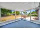 Enjoy your outdoor space in this enclosed and screened sun room at 208 Palmetto W Rd, Nokomis, FL 34275