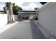View of the backyard, including a patio, table and chairs, and the rear of the house at 2304 W Rio Vista Ave, Tampa, FL 33603