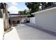 Inviting backyard features a patio area with seating, creating a perfect spot for outdoor relaxation and entertainment at 2304 W Rio Vista Ave, Tampa, FL 33603