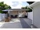 Inviting backyard features a patio area with seating, creating a perfect spot for outdoor relaxation and entertainment at 2304 W Rio Vista Ave, Tampa, FL 33603