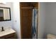 Bathroom features a modern vanity, tile floors and a glass-enclosed shower, providing a clean and stylish space at 2304 W Rio Vista Ave, Tampa, FL 33603