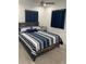 Comfortable bedroom with cozy bedding complemented by stylish decor, making it inviting at 2304 W Rio Vista Ave, Tampa, FL 33603