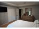 Bedroom features closet and dresser, offering ample storage solutions for an organized and comfortable living space at 2304 W Rio Vista Ave, Tampa, FL 33603