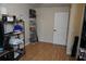 Bedroom features neutral tones with storage shelving, offering a versatile layout for various purposes at 2304 W Rio Vista Ave, Tampa, FL 33603