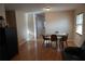 Open-concept dining area featuring wood floors and ample natural light at 2304 W Rio Vista Ave, Tampa, FL 33603