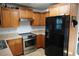 Well-appointed kitchen features wood cabinetry, stainless steel appliances, and ample counter space at 2304 W Rio Vista Ave, Tampa, FL 33603