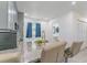 The kitchen has granite countertops, stainless steel appliances, and bar seating, perfect for entertaining at 2304 W Rio Vista Ave, Tampa, FL 33603