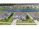 Beautiful home with water view nestled in a community with stunning lake at 2492 Overfalls Pl, Wesley Chapel, FL 33543