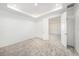 Spacious carpeted bedroom with recessed lighting and neutral walls leading to another room at 2492 Overfalls Pl, Wesley Chapel, FL 33543
