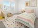Adorable bedroom with themed decor, a comfortable bed, and a playful, inviting atmosphere at 2492 Overfalls Pl, Wesley Chapel, FL 33543