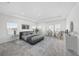 Spacious main bedroom with tray ceilings, plush carpets, and ample natural light at 2492 Overfalls Pl, Wesley Chapel, FL 33543