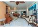 Spacious living room with seating, dining room, and hardwood floors with access to other rooms at 33 Cypress Dr, Palm Harbor, FL 34684