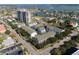 Aerial view of apartments with a large pool and a bay view at 400 Island Way # 1606, Clearwater Beach, FL 33767