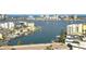 Scenic view of a bay dotted with boats and waterfront properties at 400 Island Way # 1606, Clearwater Beach, FL 33767