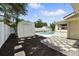 Lovely backyard with a well-maintained shed, beautiful swimming pool, and elegant patio area at 4611 W Bay Court Avenue, Tampa, FL 33611