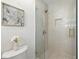 Bright bathroom with tiled shower, and neutral fixtures at 4611 W Bay Court Avenue, Tampa, FL 33611