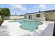 Backyard pool with deck and white fence at 4611 W Bay Court Avenue, Tampa, FL 33611