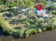Scenic waterfront property with lush greenery and a private boat dock, perfect for water enthusiasts at 4915 South Rd, New Port Richey, FL 34652