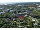 Serene waterfront property nestled among trees and waterways providing a peaceful living experience at 4915 South Rd, New Port Richey, FL 34652