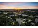 Panoramic aerial view of a coastline and properties at sunset at 4915 South Rd, New Port Richey, FL 34652