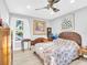 Bedroom with natural light and ceiling fan at 4915 South Rd, New Port Richey, FL 34652
