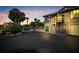 Exterior view of the home showcasing a lift, garage, and fenced pool area at 4915 South Rd, New Port Richey, FL 34652