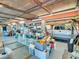 Spacious garage with ample storage and a vehicle, ideal for projects and secure parking at 4915 South Rd, New Port Richey, FL 34652