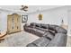 Spacious living room featuring a comfortable sectional sofa at 4915 South Rd, New Port Richey, FL 34652