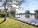 Waterfront property with a dock and serene water views at 4915 South Rd, New Port Richey, FL 34652