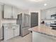 Kitchen featuring stainless steel appliances and granite countertops at 5474 Flint Hills Dr, Wimauma, FL 33598