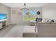 Bright living room with neutral decor and an open layout at 5474 Flint Hills Dr, Wimauma, FL 33598