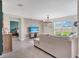 Cozy living room featuring stylish decor and plenty of natural light at 5474 Flint Hills Dr, Wimauma, FL 33598